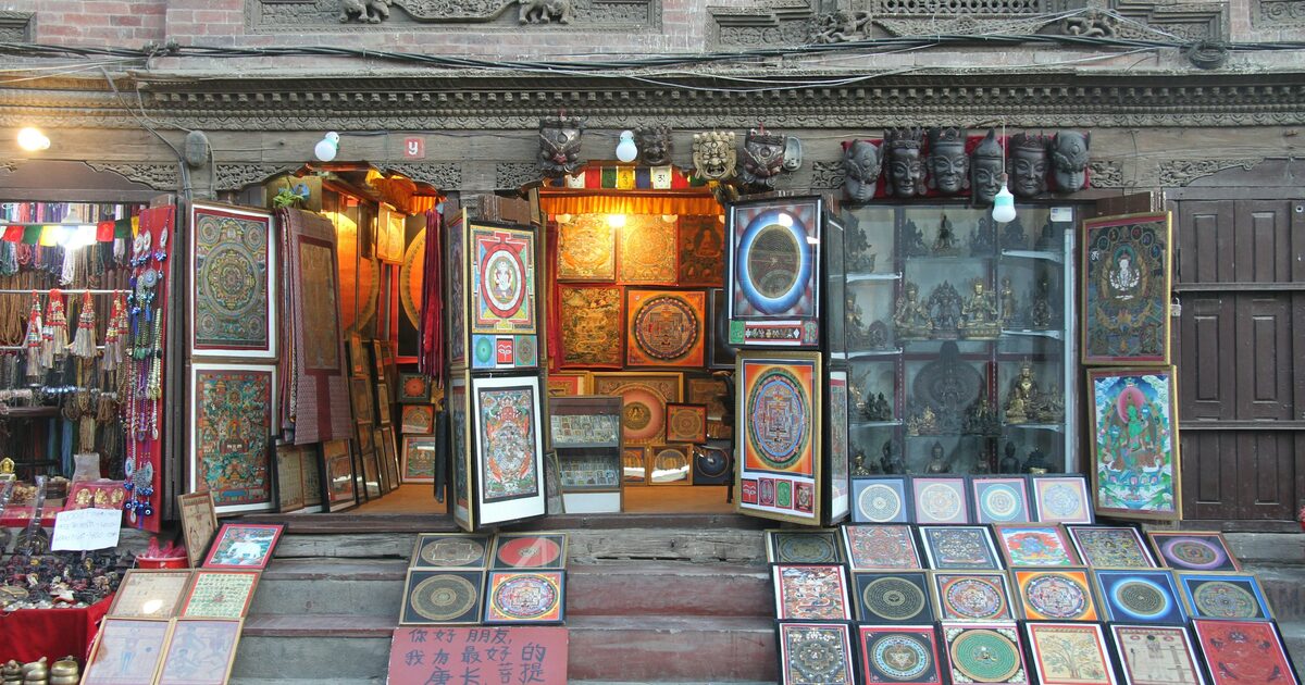 A small storefront in Kathmandu with many different items on display
